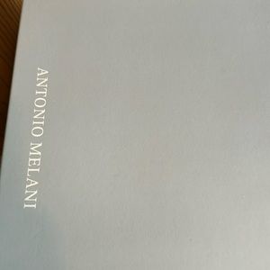 Antonio Melani never worn